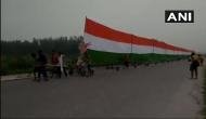 Uttar Pradesh: 35 Kanwar pilgrims carry 361-feet long tricolour