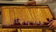 Gold futures down on profit-booking