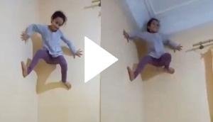 5-year-old girl climbs wall like a spiderman; video will leave you rubbing your eyes